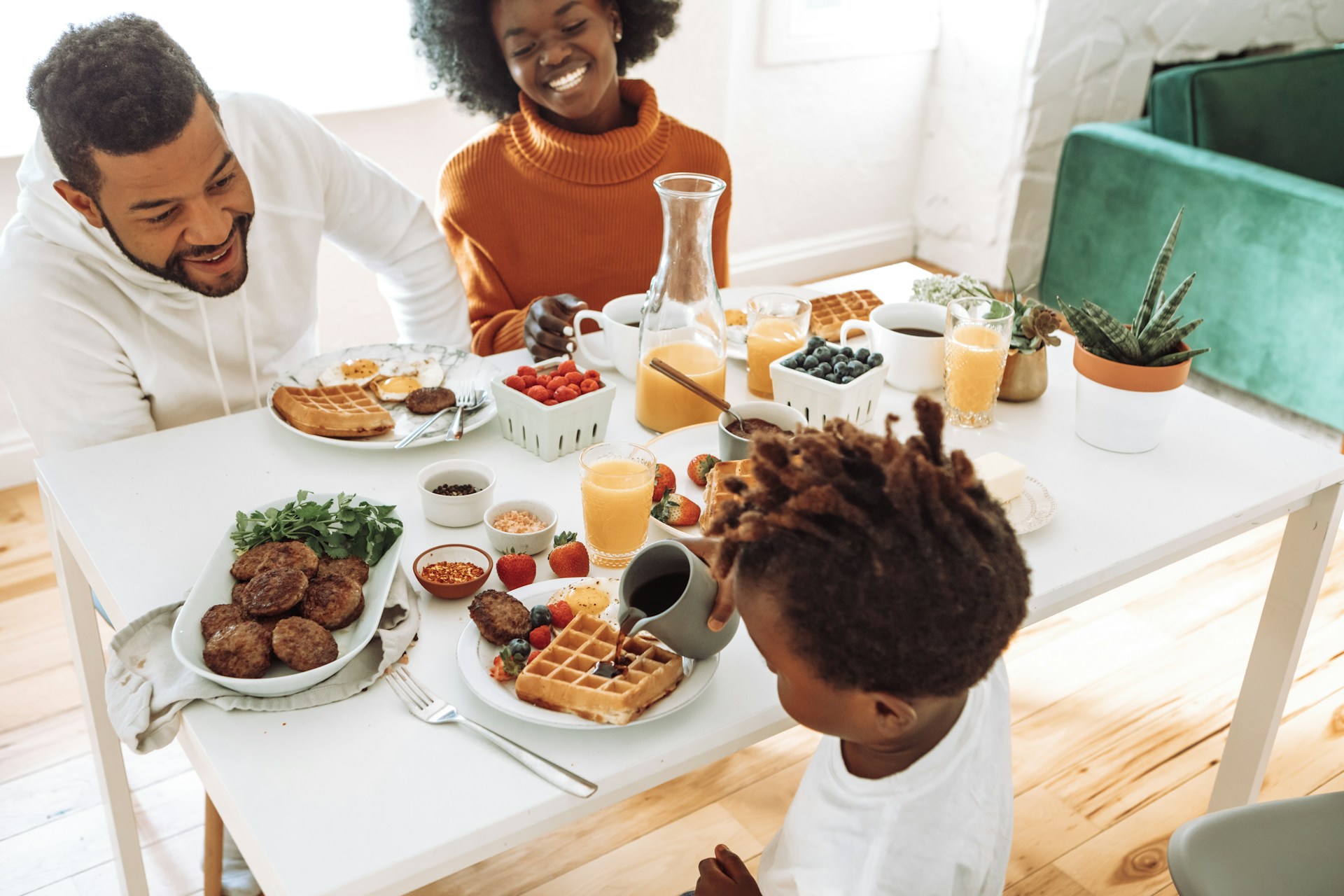 Family looking at shared task board together